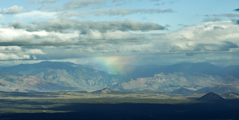 Rainbow twixt distant foothills