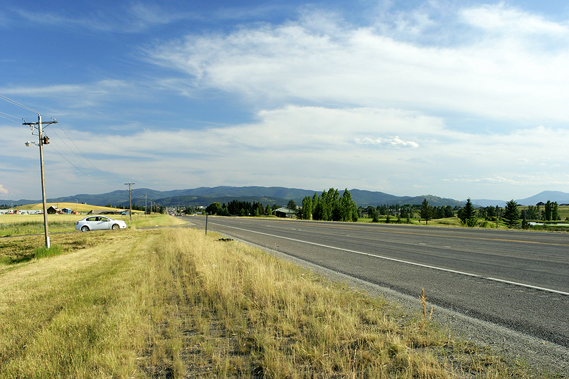 Big sky, mountains, endless grasslands, trees and so on. Between Kalispell and Bigfork