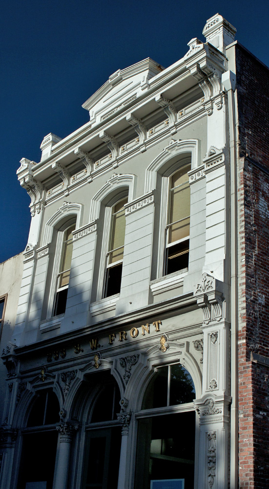 Built 1885, cast-iron facade. 223 SW Front Str.