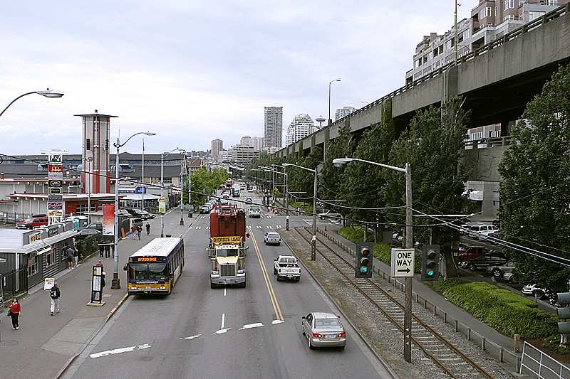Left - wharf/tourist areas; middle, highway and train tracks; right, double-decker major highway, with luxury condos right next to them