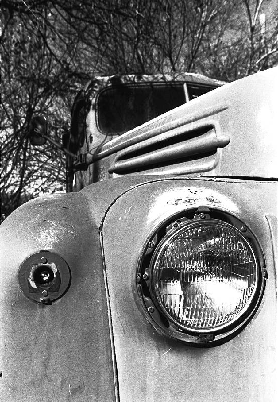 Weathered truck with brilliant headlight