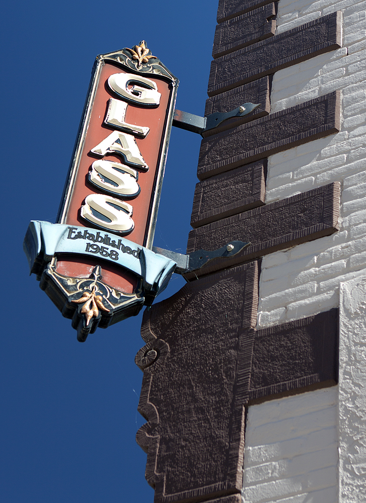 Great old sign; showing neglect reflected throughout the town. McCasland Glass Inc.? (estblished 1958)